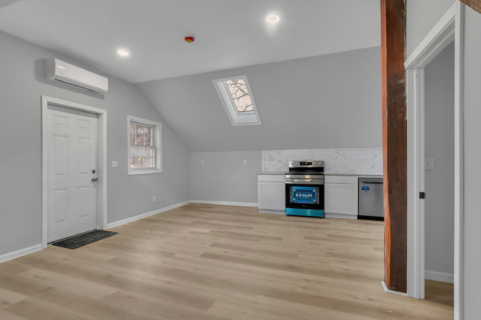 Light oak LVP flooring in renovated room